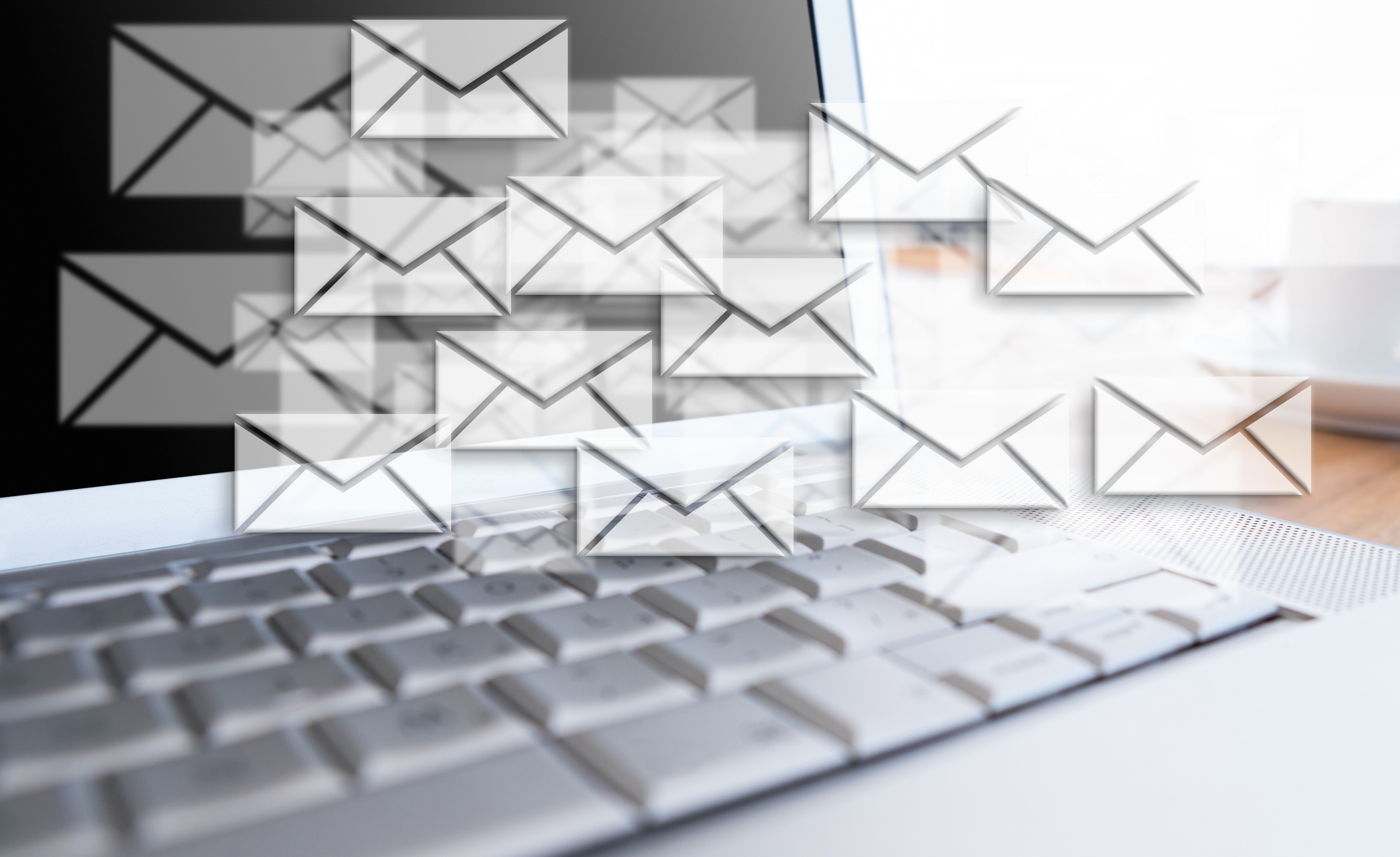 messages floating over laptop